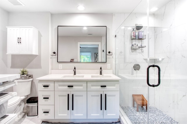 bathroom with vanity and walk in shower