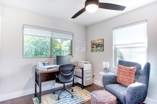 office area featuring dark wood-type flooring and ceiling fan