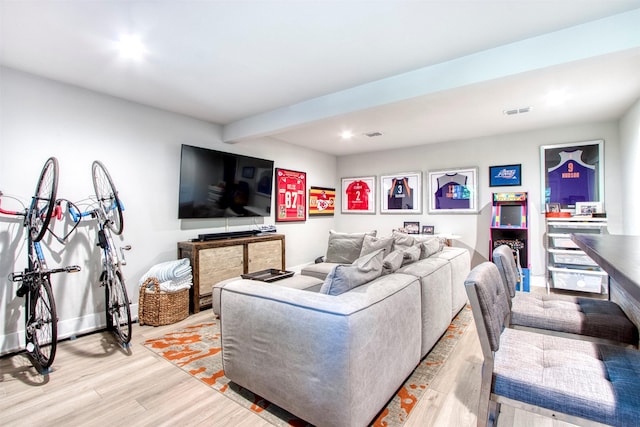 living room with light hardwood / wood-style floors