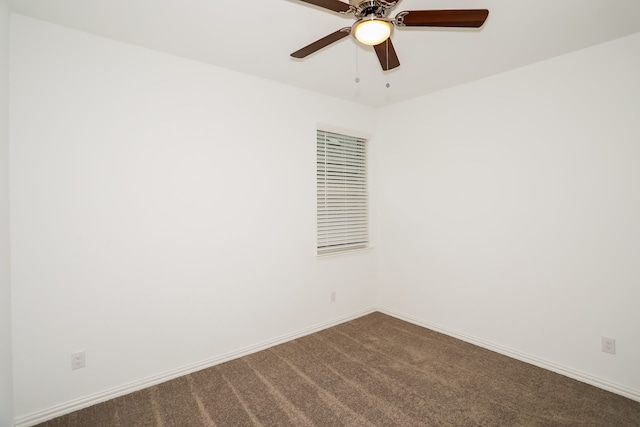 empty room with ceiling fan and carpet