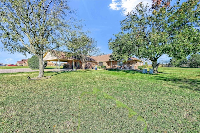 ranch-style house with a front yard