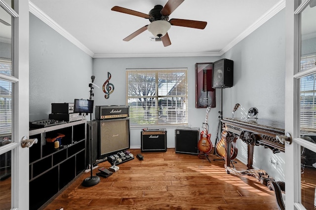 239 W Line Rd, Whitesboro, TX 76273 - kitchen featuring healthy amount of natural light, wood finished floors, crown molding, and a ceiling fan