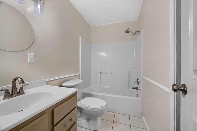 full bathroom featuring tile patterned flooring, vanity, bathtub / shower combination, and toilet