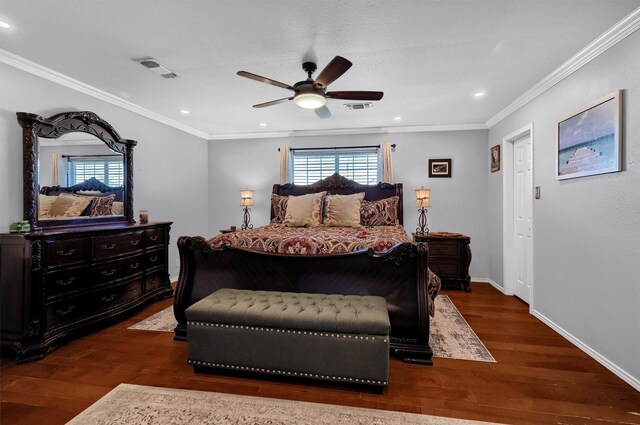 bedroom with ceiling fan, dark wood-type flooring, and ornamental molding