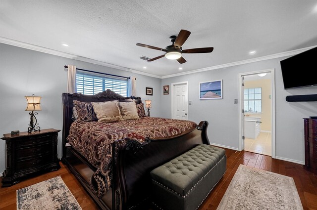 bedroom featuring ensuite bathroom, a textured ceiling, ceiling fan, crown molding, and dark wood-type flooring