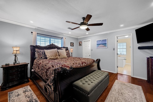 bedroom with crown molding, dark hardwood / wood-style floors, and a textured ceiling