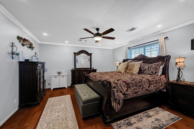 bedroom with ceiling fan, dark hardwood / wood-style flooring, a textured ceiling, and ornamental molding