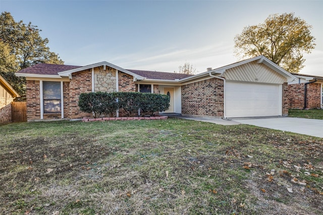 single story home with a garage and a front yard