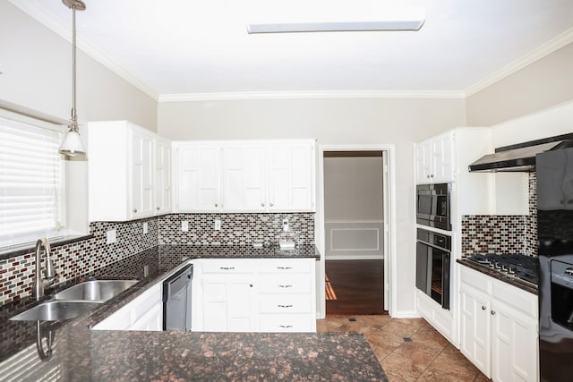 kitchen featuring pendant lighting, white cabinets, crown molding, and appliances with stainless steel finishes