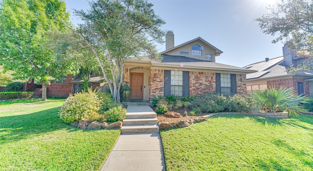 view of front of home with a front yard