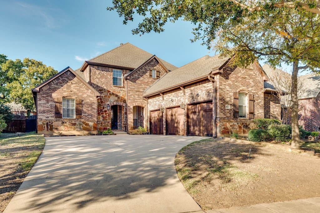 view of front of property with a garage