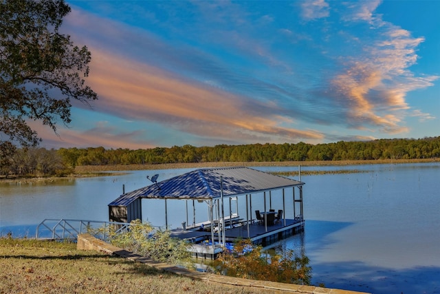 dock area featuring a water view