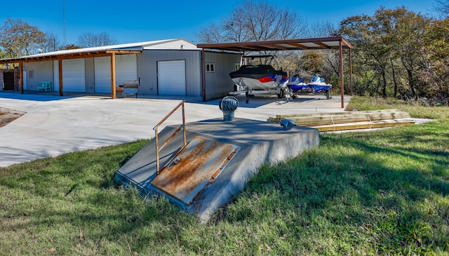 entry to storm shelter featuring an outdoor structure and a lawn