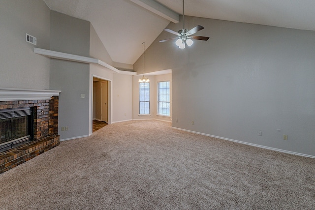 unfurnished living room with carpet, a brick fireplace, ceiling fan with notable chandelier, beam ceiling, and high vaulted ceiling