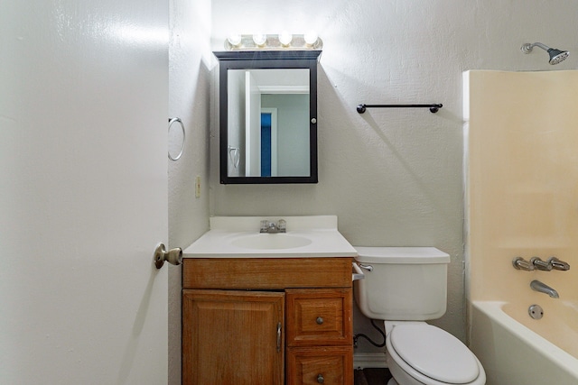 full bathroom with shower / bath combination, vanity, and toilet