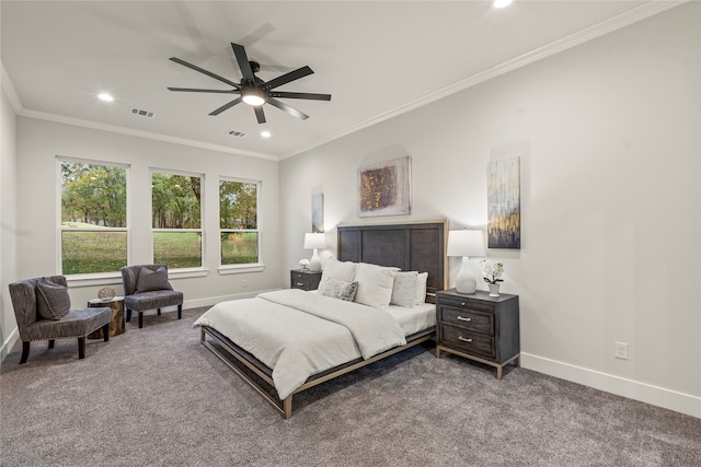 bedroom with ceiling fan, crown molding, and carpet floors