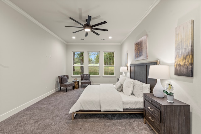 carpeted bedroom with ceiling fan and crown molding