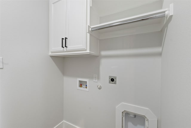 laundry room with hookup for an electric dryer, hookup for a gas dryer, cabinets, and hookup for a washing machine