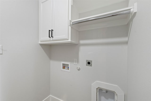 washroom featuring gas dryer hookup, cabinets, hookup for a washing machine, and electric dryer hookup