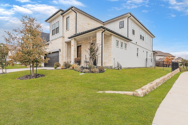 view of home's exterior featuring a lawn and a garage