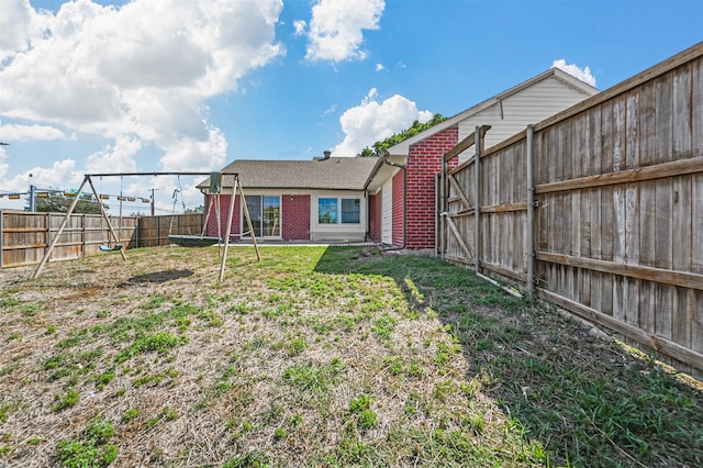 view of yard featuring a playground