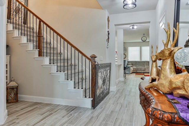 entrance foyer with light hardwood / wood-style floors