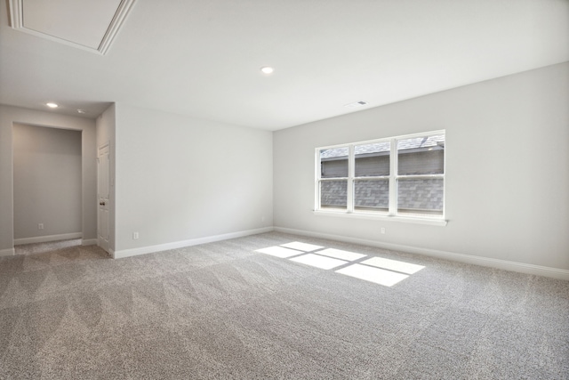 unfurnished room with carpet flooring