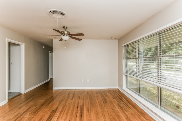 spare room featuring hardwood / wood-style flooring