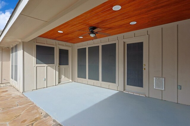 view of patio featuring ceiling fan