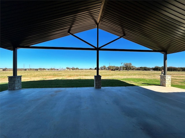 view of patio with a rural view