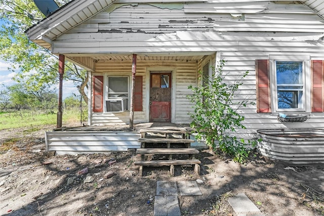 entrance to property with covered porch