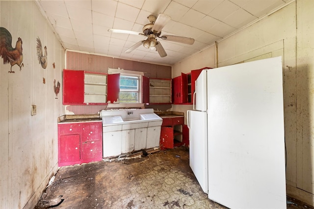 kitchen featuring ceiling fan and white refrigerator