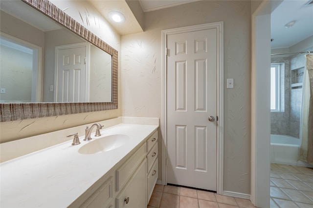 bathroom with shower / tub combo, vanity, and tile patterned floors