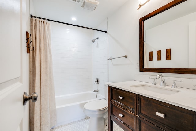 full bathroom featuring tile patterned flooring, shower / tub combo, vanity, and toilet