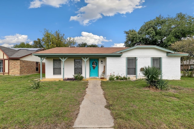 view of front of home featuring a front lawn