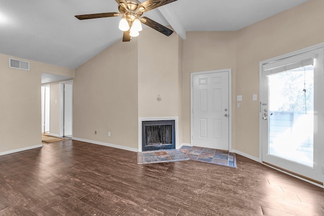 unfurnished living room featuring dark wood-type flooring, ceiling fan, and lofted ceiling with beams