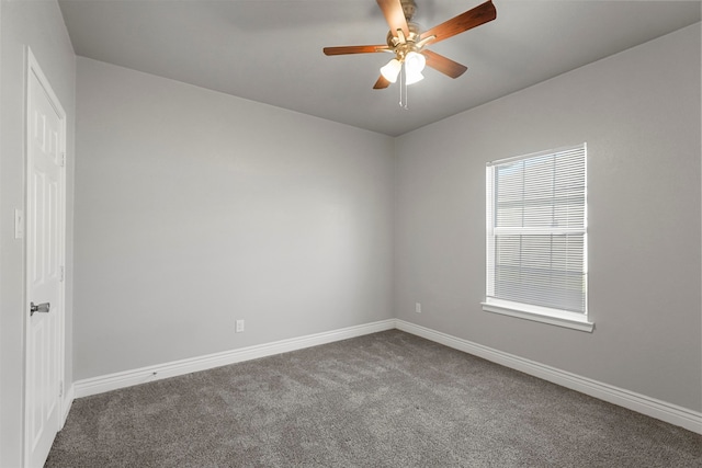 carpeted empty room with ceiling fan