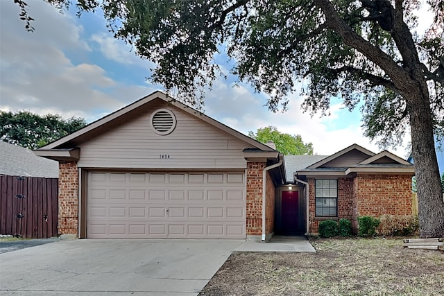 ranch-style home with a garage