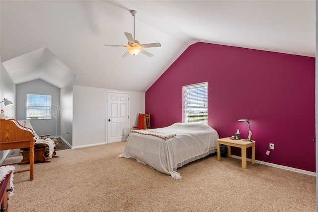 bedroom with carpet floors, vaulted ceiling, and ceiling fan