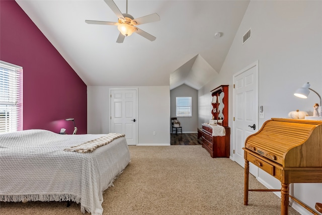 bedroom featuring carpet floors, ceiling fan, and lofted ceiling