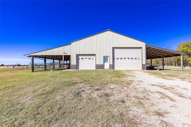 garage featuring a carport