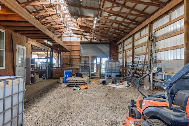 misc room with high vaulted ceiling