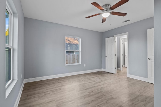 unfurnished bedroom featuring ceiling fan and light wood-type flooring