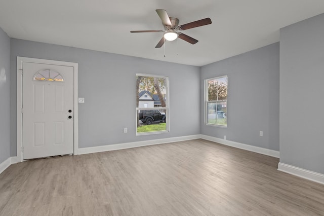 interior space featuring ceiling fan and light wood-type flooring