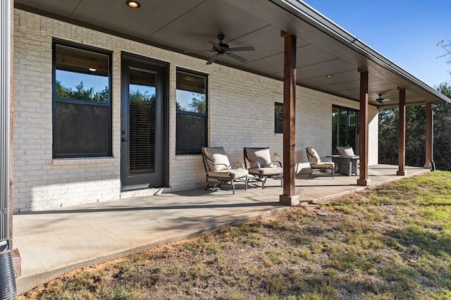 view of patio featuring ceiling fan