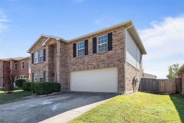 view of front of property with a garage and a front yard