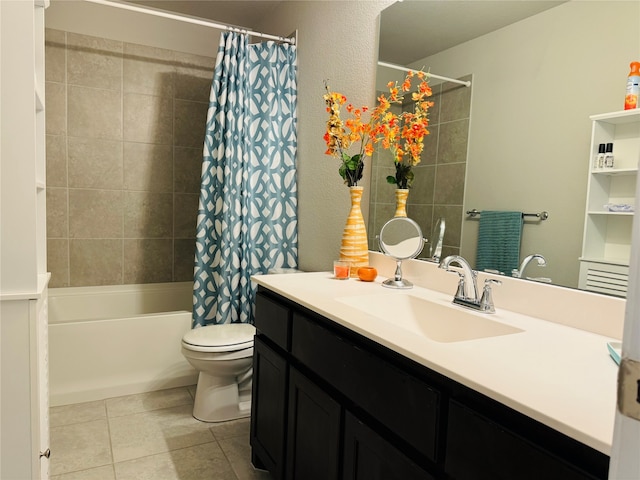 full bathroom featuring tile patterned floors, shower / bath combo, toilet, and vanity