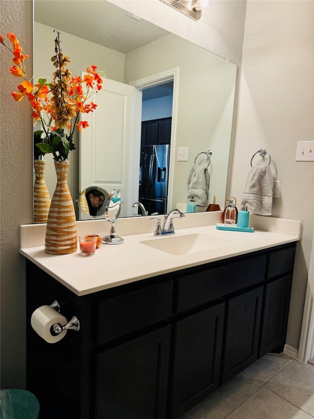 bathroom featuring vanity and tile patterned floors