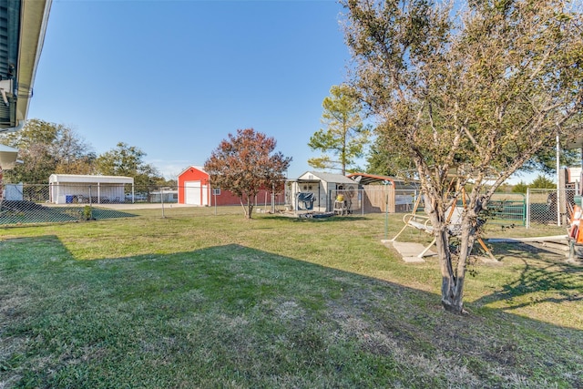 view of yard with an outdoor structure