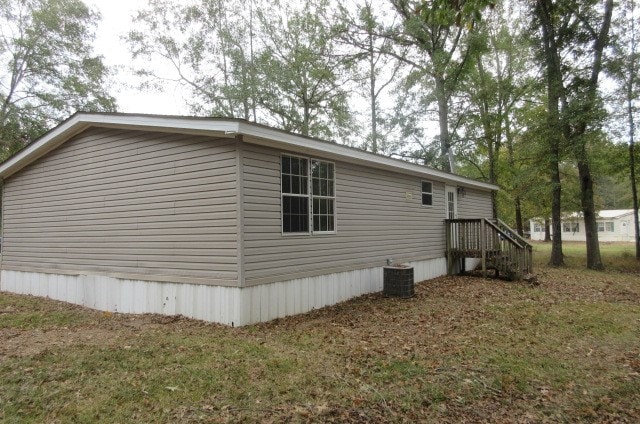 view of home's exterior featuring central AC